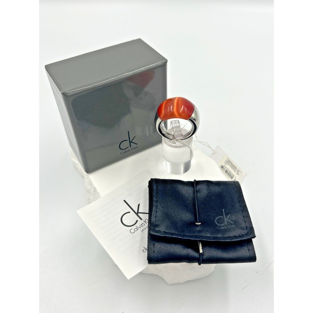 Calvin Klein Stainless Steel Silver Tone w/Orange Stone Ellipse Ring Size 7